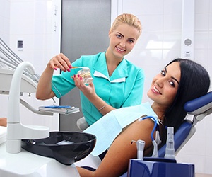 patient getting dental bridge in Portland 