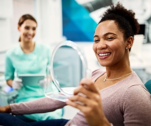 Woman smiling at the dentist’s office
