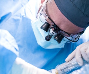 A dentist performing dental work on a patient