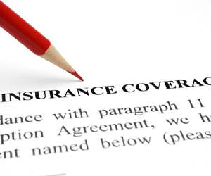 Insurance coverage policy and red pen