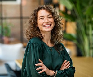 Woman smiling after meeting with Guardian dentist in Portland 