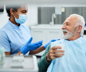 An older man smiling