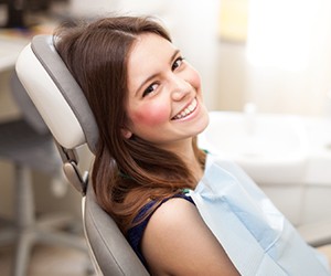 Smiling woman in dental chair